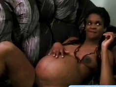 Pregnant black babe takes chocolate cock in pussy